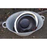 A galvnised tin footbath - sold with three basins - various condition