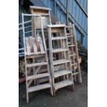 Four vintage wooden step ladders and another - for display use