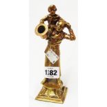 A bronze figurine of Bob Cratchit with Tiny Tim on his shoulder, entitled A Merry Xmas and bearing
