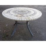 A 1.22m diameter heavy cast resin tile effect topped garden table