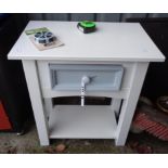 A 54.5cm modern painted wood bedside table with drawer and undertier