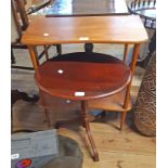 A 29cm retro teak effect two tier stand - sold with a mahogany effect tilt-top pedestal wine table