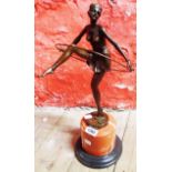 A modern bronzed Art Deco style lady dancing with a hoop