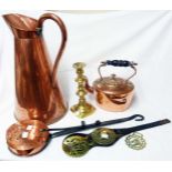 A large copper jug, Victorian copper kettle, chestnut roaster, horse brasses, etc.