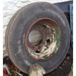 A lorry wheel with worn tyre