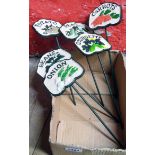 A set of six painted vegetable labels