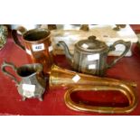 A copper mug, bugle, plated teapot and cream jug