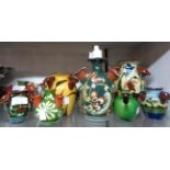 Eleven Torquay pottery tulip or udder vases including Longpark, Aller Vale, HM Exeter, etc. -