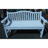 A white painted garden bench