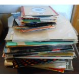 A quantity of vinyl LPs and 45s including Acker Bilk, Craig Douglas, The Wurzels, Jim Reeves, etc.