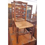 Four similar Lancashire elm framed ladder back standard chairs (various condition) - sold with a