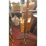 A 20th Century rustic oak adjustable gallows style standard lamp with hanging lantern fitment
