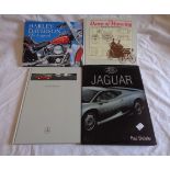 A small collection of automobila related books and ephemera including Harley Davidson, Jaguar, etc.