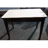 A pine table with formica top