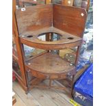 A 61cm Victorian mahogany corner washstand with apertures to top and drawer under, set on splayed