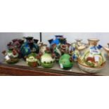 Sixteen Torquay pottery tulip or udder vases including Aller Vale, HM Exeter, Longpark, Watcombe,