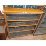 A 1.10m old oak four shelf open bookcase with moulded decoration