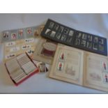 A small box containing sets and part sets of loose cigarette cards, including Wills garden