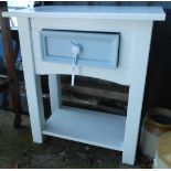 A 54.5cm modern painted wood bedside table with drawer and undertier