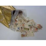 A bag containing assorted loose cigarette cards - various condition