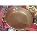 A copper preserve pan