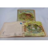 Two antique large panorama pop up books, comprising Wild Animal Stories and Peeps into Fairy