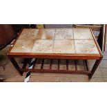 An 85cm vintage teak framed coffee table with tile inset top and slatted undertier, set on moulded