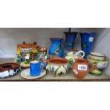 A collection of Devon pottery including a pair of Devon Tors vases, P.A.W. Pottery jug, Buckfast