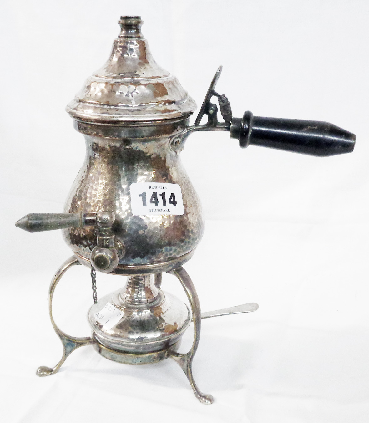 An early 20th Century silver plated spirit kettle with hammered finish