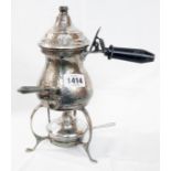 An early 20th Century silver plated spirit kettle with hammered finish