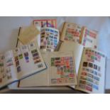 Six schoolboy albums of mainly 20th Century hinge mounted world stamps - sold with other stamps on