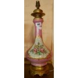 A Sevres style bottle vase lamp with pink ground, hand painted decoration and gilt brass mounts