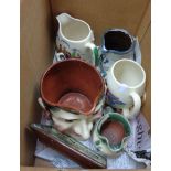 A small collection of Westcountry pottery including Royal Torquay Peter Davy character jug,