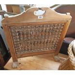 An Anglo Indian stripped mixed wood ornate spindle decorated fire screen