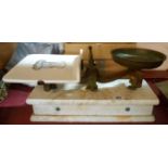 A set of balance scales with ceramic pan and slab marble base
