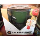 A boxed Le Creuset fondue set