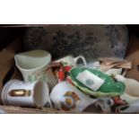 A box containing a quantity of Bovey Tracey pottery including Blue Water, Plichta, etc.