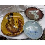 David Eeles: three studio pottery dishes in differing styles with flowers, grebe, and cockerel