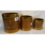 A set of three graduated early 20th Century bentwood and brass bound Half Pint, Pint and Quart grain