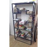 A 1m vintage Pierre Vandel (Paris) display unit with gilt lined black painted finish and stepped