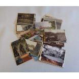 A small collection of early 20th Century and later postcards, including named seaside and rural