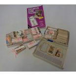 A shoebox containing a collection of sets and parts sets of cigarette cards, including Will's