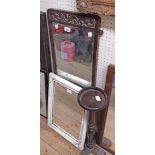 An oak framed oblong wall mirror with carved freize to top - sold with a turned wood smokers stand