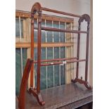 A Victorian polished mahogany double towel rail with one replacement cross rail and other glued