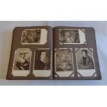 A brown postcard album containing a collection of corner mounted early 20th Century and later