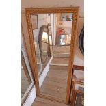 A 64cm X 1.6m vintage ornate gilt framed full length wall mirror - some restoration