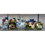 Sixteen Torquay pottery tulip or udder vases including Aller Vale, Longpark, Watcombe, etc.