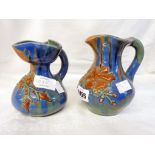 Two Elton Ware Sunflower Pottery jugs with applied flowers on a streaky ground