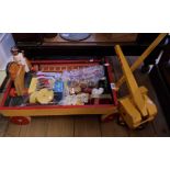 A quantity of assorted wooden and other toys including pull along cart, crane, train set, etc.