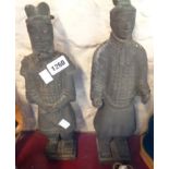 Two Chinese stoneware temple figures with unglazed black finish and text to base fronts - a/f